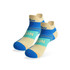 A pair of no-show running socks in light yellow, blue, and aqua, featuring a logo and geometric patterns.