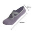 A grey yoga sock with a slip-on design and grip dots along the sole, measuring 60mm by 185mm.