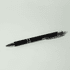 A black metal pen with silver detailing and a clip, featuring a sleek design and polished finish.