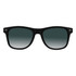Black sunglasses with gradient grey lenses and a logo on the arm.