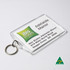 A clear hotel keychain with a ring, featuring green and white branding and a printed address. Australian made.