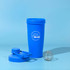 A blue 600ml shaker cup with a matching lid and a metal mixing ball, featuring a logo.