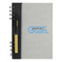 A recycled journal book featuring a grey cover, black spiral binding, and a yellow pen attached. It has a logo on the front.
