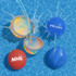 A set of vibrant reusable water balloons in red, blue, and multicoloured designs, beside a splash of water.