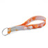 An orange and white popper stress reliever keychain with multiple popping buttons and a metal keyring.
