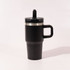 A drink bottle in black with a silver band, featuring a handle and a black lid. The product has a logo.