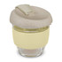 A drink bottle with a clear glass body, beige lid, and soft yellow silicone band. It features a logo.