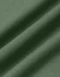 A close-up of premium cotton fabric in a soft olive green hue with a textured surface.