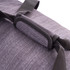 A grey duffle bag with a padded handle and adjustable straps. It features a textured fabric and a logo.