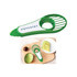 A green and white avocado cutter with a slicing grid and core remover, placed on a wooden cutting board with avocado slices.