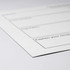 A white magnetic whiteboard with black outline sections for notes, featuring a logo in the corner.