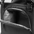 A black cooler seat with an open zipper compartment and a grey interior lining. It features adjustable straps.