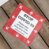 A floor decal sticker with a red background and white arrows, featuring text about staying 1.5m apart.