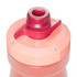 A drink bottle in shades of pink with a red spout and cap, featuring a logo.