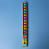 A 30cm popper ruler featuring a vibrant design with blue and multicoloured dots, alongside a logo.