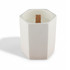 A white hexagonal ceramic candle with a wooden wick placed inside. It has a minimalist design.