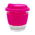 A reusable coffee cup with a clear glass body and bright pink silicone sleeve and lid. Features a branding logo.
