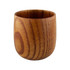 A small wooden coffee cup with a smooth, polished finish and natural grain patterns.