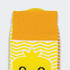 A pair of bright yellow and white knitted socks featuring a playful design and a branded logo.
