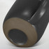 A ceramic mug in matte black with a contrasting textured base, featuring a subtle logo. Perfect for coffee or tea.