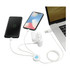 A white 5-in-1 charging cable connects two smartphones and a charging case to a laptop, featuring a logo.