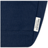 A dark blue recycled cotton tote with a label indicating it is made from recycled materials.