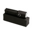A black LED torch with a textured grip, resting on a black box. It features a button on the side.