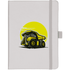 A hard-bound journal in white featuring a yellow and black design of a dump truck, complete with an elastic closure.