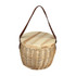 A wicker cooler basket in natural tones with a wooden lid and a brown shoulder strap. It features a branding logo.