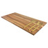 A wooden cheeseboard with three gold-coloured cheese knives resting on it.