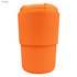 An orange reusable coffee cup with a ribbed design and a lid, featuring a logo.