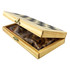 A wooden play case with a geometric design, opened to reveal various game pieces inside. The case is light-coloured.