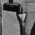A grey Techpac Laptop Backpack featuring a side pocket with a smartphone partially visible.