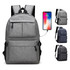 A grey laptop backpack with multiple pockets, featuring a charging port and branding. Includes two additional colour options.
