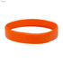 An orange silicone wristband with a smooth finish, featuring a logo.