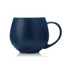 A drink mug in navy blue with a rounded shape and a sturdy handle. It has a contrasting white interior.