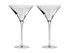 A set of two clear glass martini glasses with a sleek and elegant design. Each glass features a long stem.