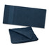 A dark blue Dune Beach Towel with a textured surface and a smooth band at one end, folded and laid out flat.