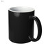 A black coffee mug with a glossy finish and a contrasting white interior, featuring a handle and a branding logo.