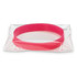 A pink silicone wristband in a clear packaging, designed to glow in the dark. It features a logo.