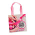 A cotton gift bag featuring a design for Breast Cancer Awareness Month, with pink ribbon graphics and supportive text.