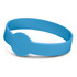 A blue silicone wristband with a debossed design and a circular feature. It has a sleek, flexible appearance.
