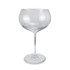 A clear glass with a wide bowl and slender stem, designed for serving drinks.