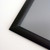 Close-up of black metal snap frame with 0.59-inch profile and mitered corner for retail signs, posters and wall displays, Item# CSF125-1824