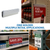 Clear magnetic sign holder displayed with promotional and price cards on retail fixtures.