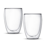 Two clear glass tumblers featuring a double wall design, offering an elegant and modern look.