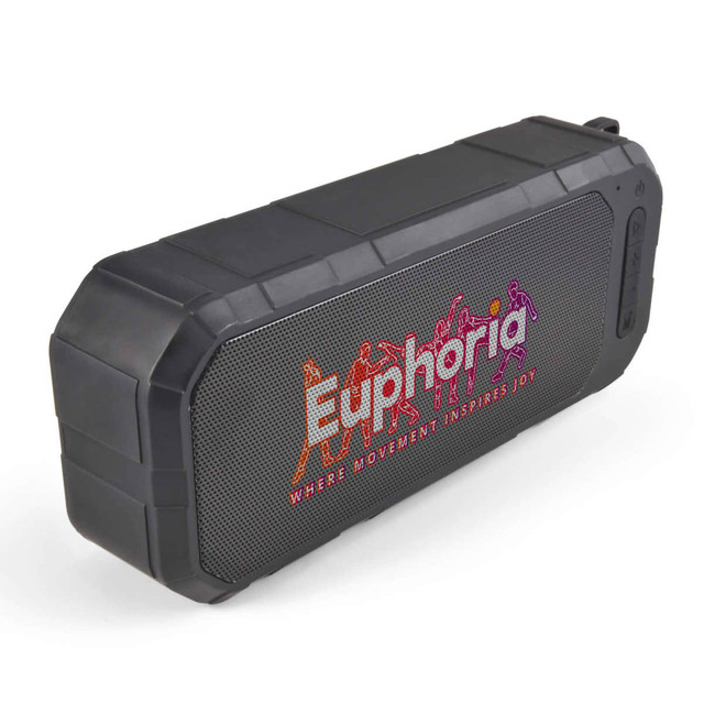 A black, water-resistant speaker with a textured surface and a prominent logo on the front.