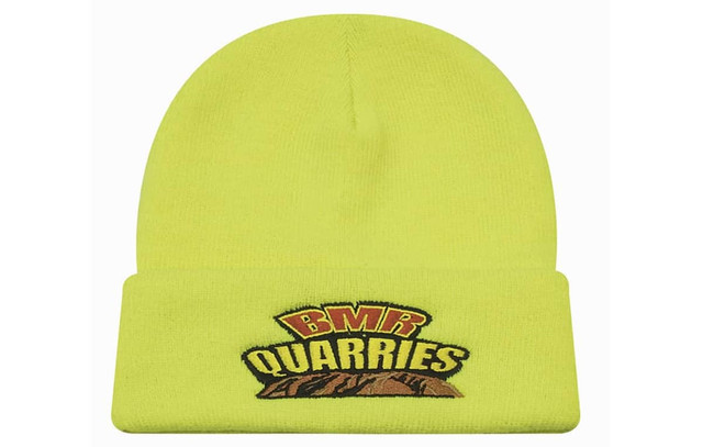 A luminescent yellow beanie with a logo and a folded cuff.