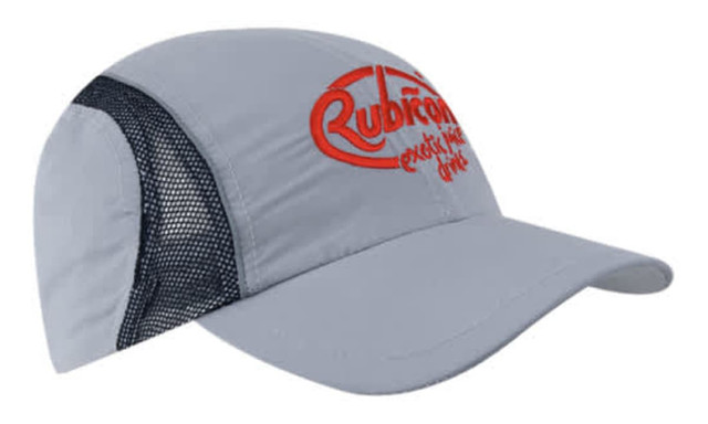 A grey sports cap with a mesh side, featuring a reflective trim and a logo on the front.