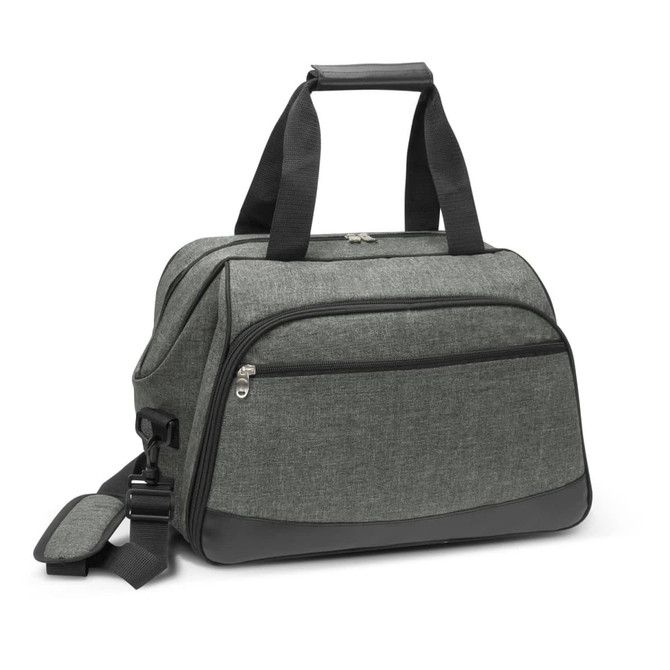 A stylish green picnic bag with a zippered front pocket and adjustable shoulder strap, designed for outdoor meals.